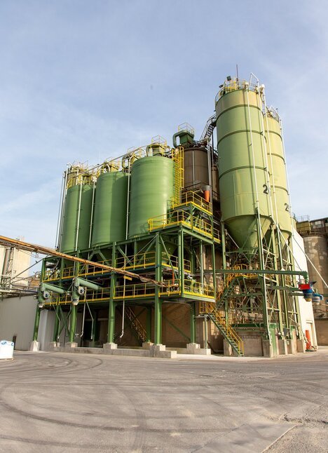 Polyester silos including trestle construction